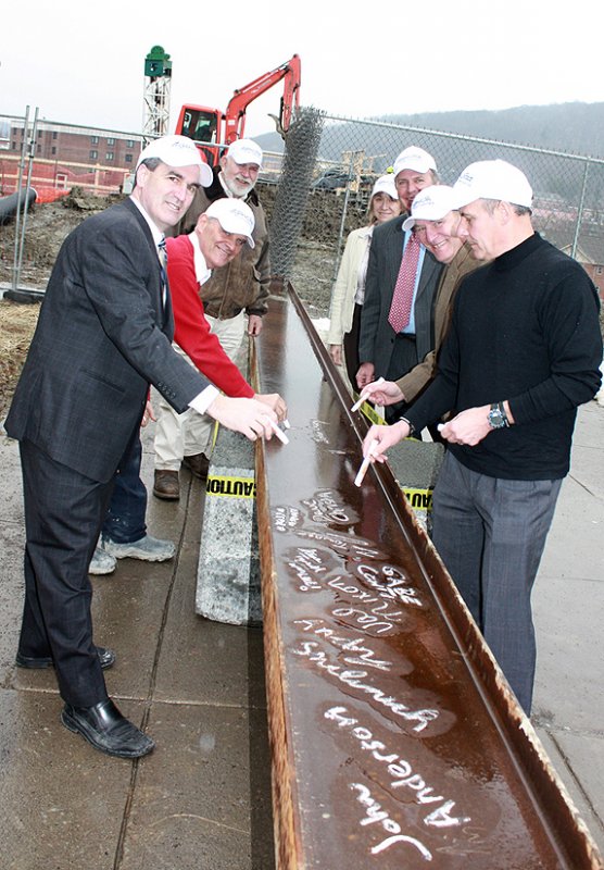 signing the SLC ceremonial beam