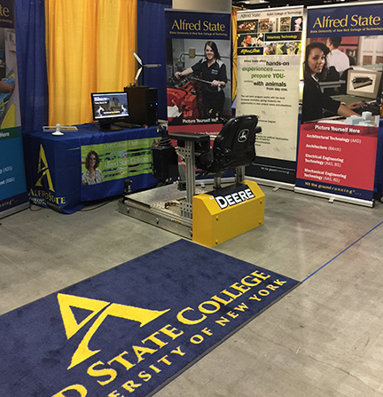 A heavy equipment simulator was one of the highlights of Alfred State College’s recruiting booth at the 91st annual National FFA Convention and Expo in Indianapolis, IN.