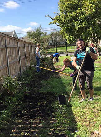 Alfred State volunteers work on creating a wetland exhibit area on a recent civic engagement project trip to New Orleans.