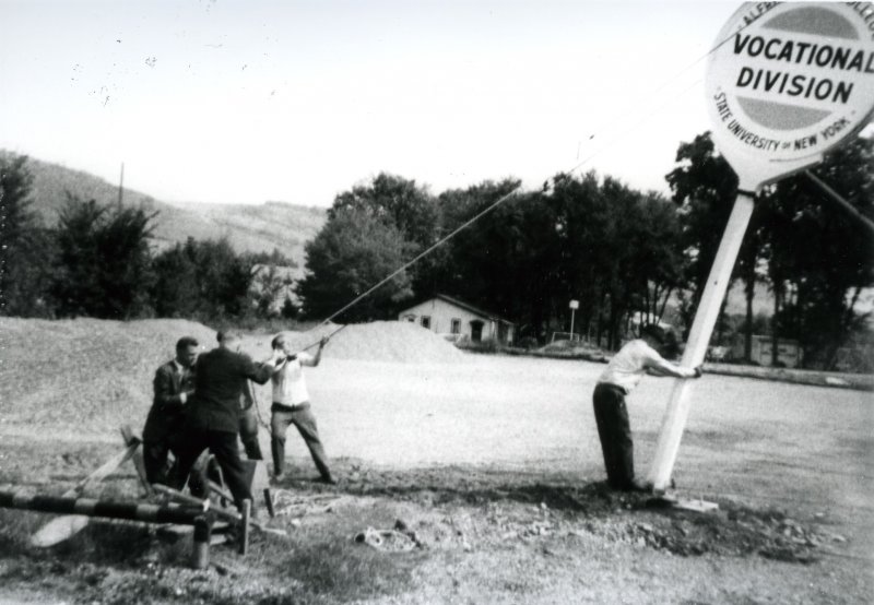 In 1966, Alfred State students and staff erect a sign in Wellsville as the first classes were held on the former Sinclair Refinery site.