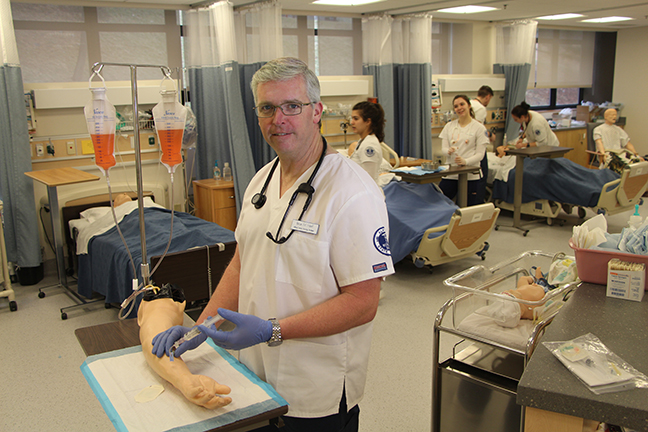 Pictured is nursing student and Air Force veteran Brian Hierl, of Nunda in a nursing lab on campus