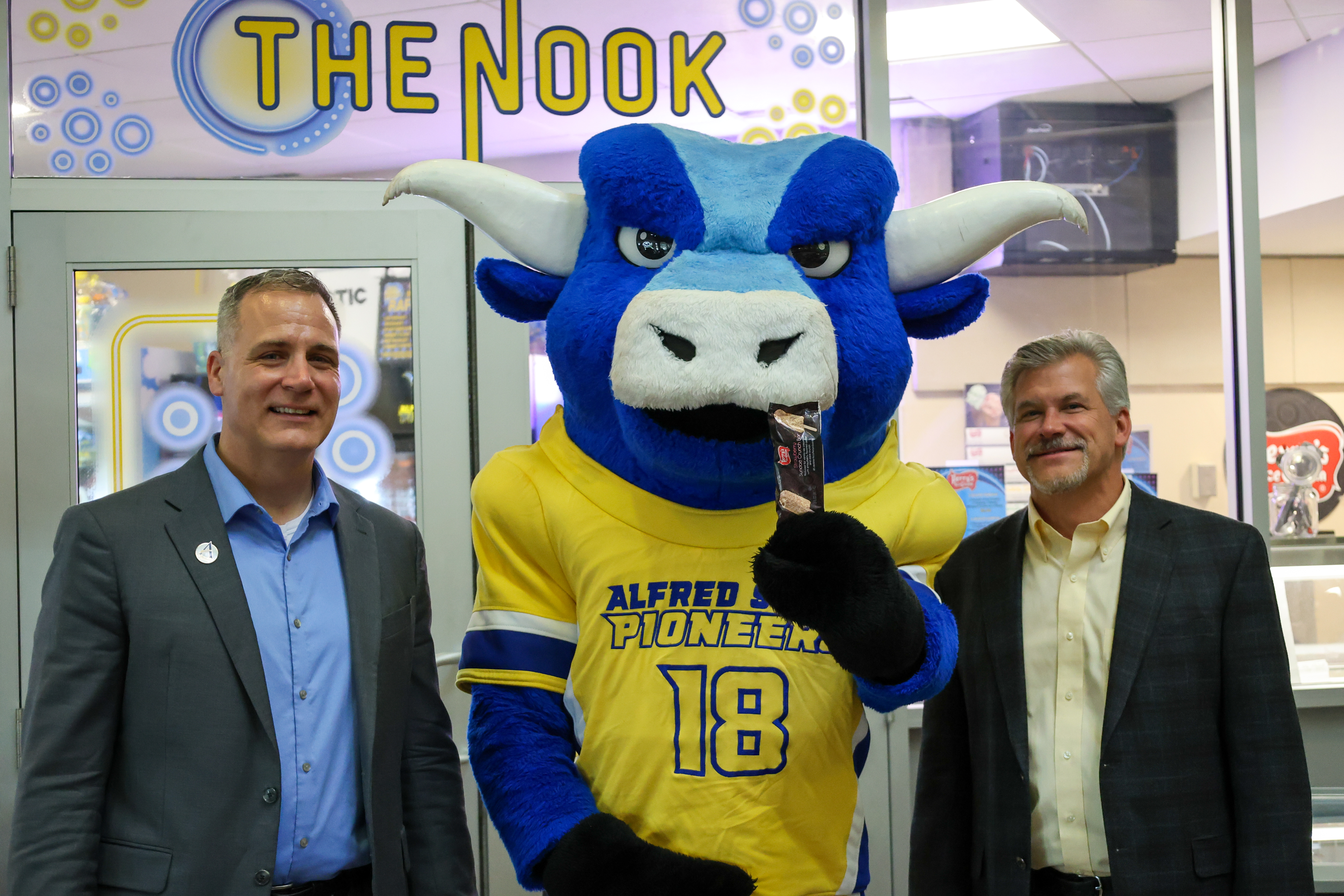 Dr. Mauro, Big Blue, and Brian Perry outside "The Nook"