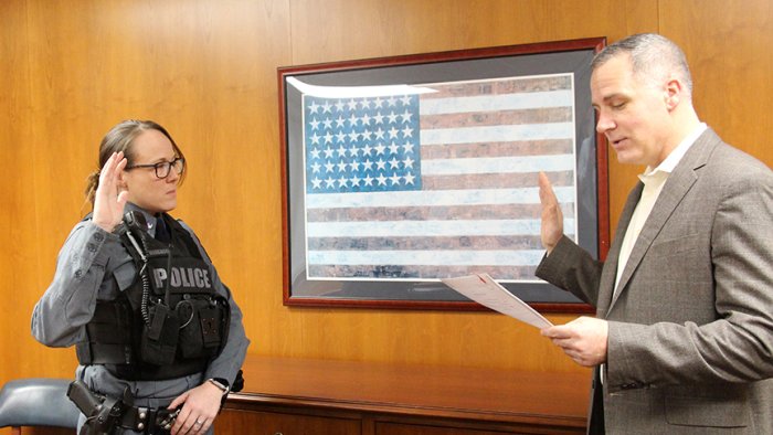 Officer Jessica Middaugh is sworn in by Alfred State President Dr. Steven Mauro.