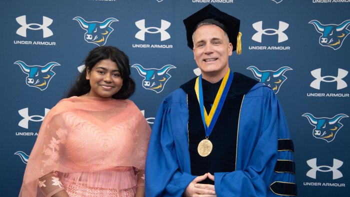 Alfred State Student Senate President Soumya Konar poses with President Dr. Steven Mauro prior to Honors Convocation.