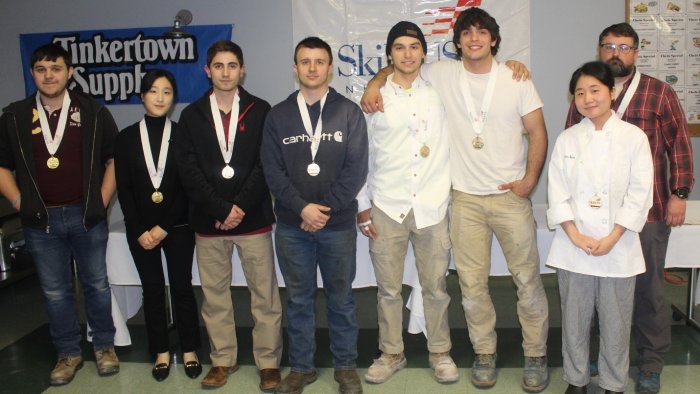 Skills USA Postsecondary Championship Gold medal winners – Left to Right:  Alexander Bieber, Chris Lee, Jared Coffin, Lucas Miranda, Jared George, Sean Malenfant, Dahyun Nam, and Larry Knoll.