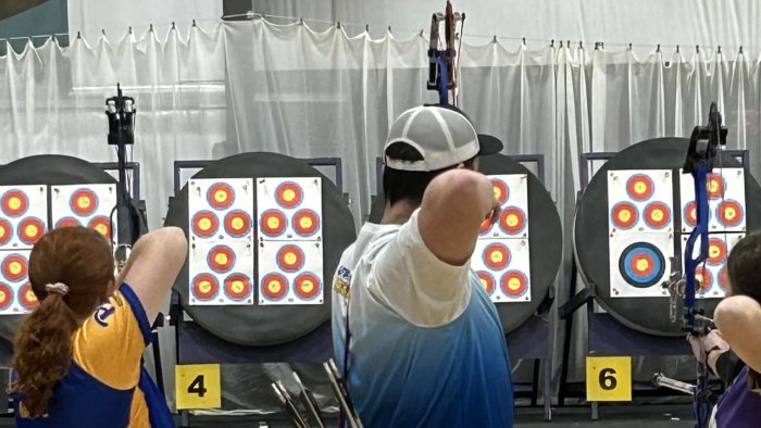 Brandon Stanton takes aim at an archery competition.