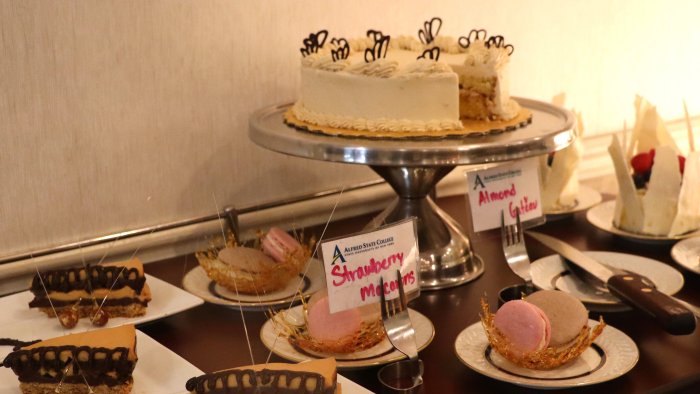 Desserts displayed on a dining cart