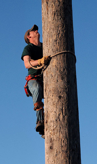 McCadden competes in the pole climb.