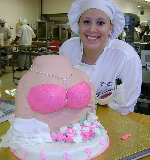 Nicole Wagner with breast cancer cake