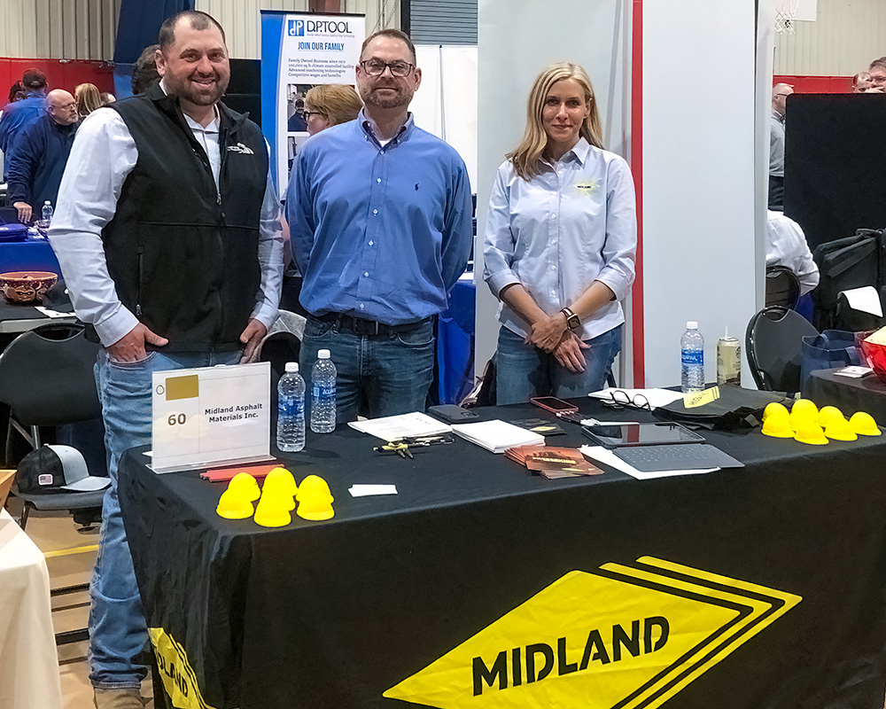 Photo of Nick Taft, Midland Asphalt Sales Coordinator, Nels Anderson, and Mary Miller, Midland Asphalt Recruitment Coordinator at the career fair. 