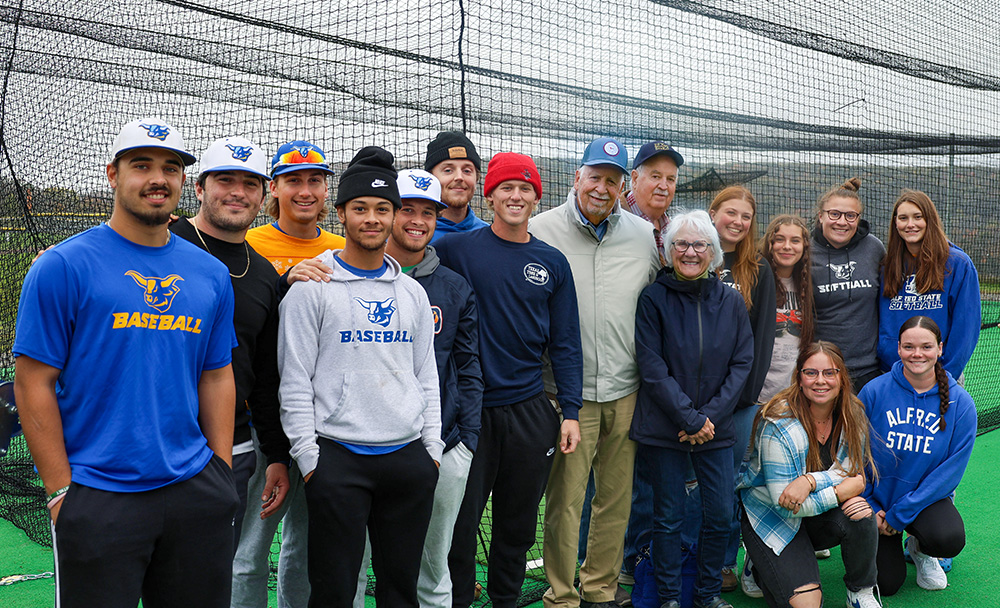The Wamp family with current baseball and softball players that will directly benefit from their gift.