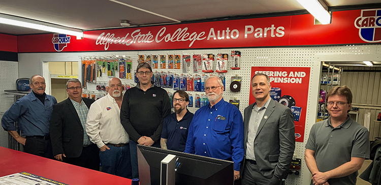 Group photo as the new parts room opens