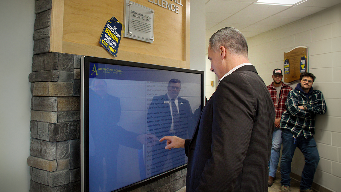ASC President Dr. Steven Mauro uses the new Wilder and Linneball Hall of Excellence.