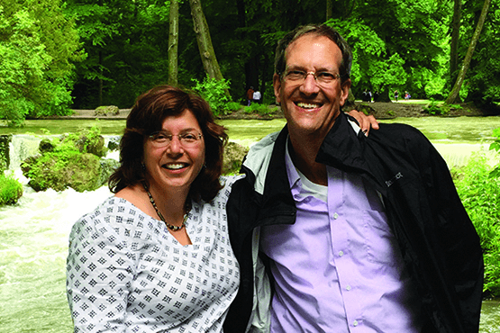 Tim and Deborah (Wallace) Moore in a wooded area