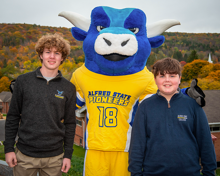 Quinn and Owen Mauro pose with Big Blue