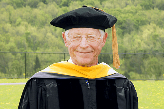 Dr. James Ferry with cap and gown on