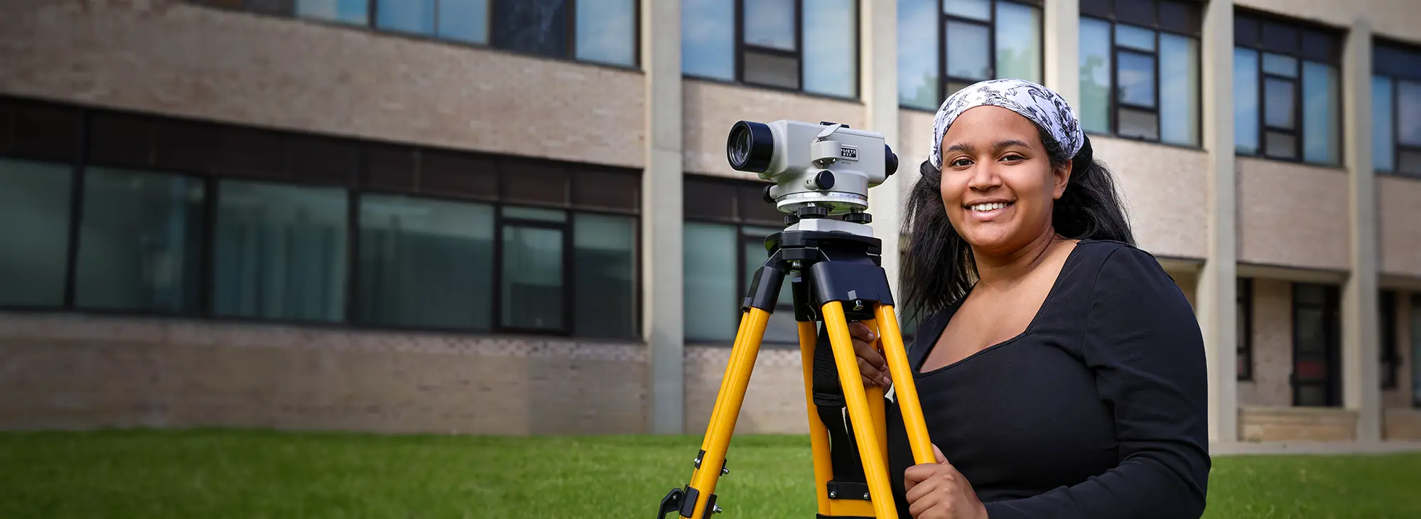 Photo of a Surveying and Geomatics Engineering Technology student