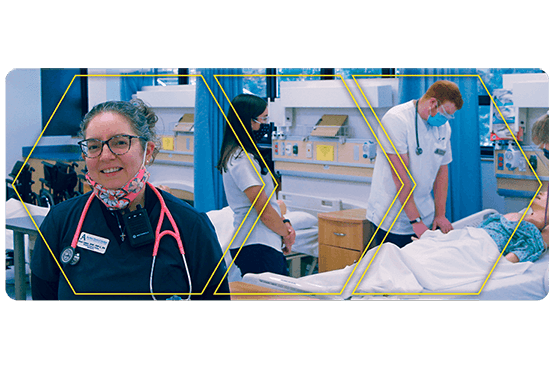 Jess Lippa in a nursing lab, students in background