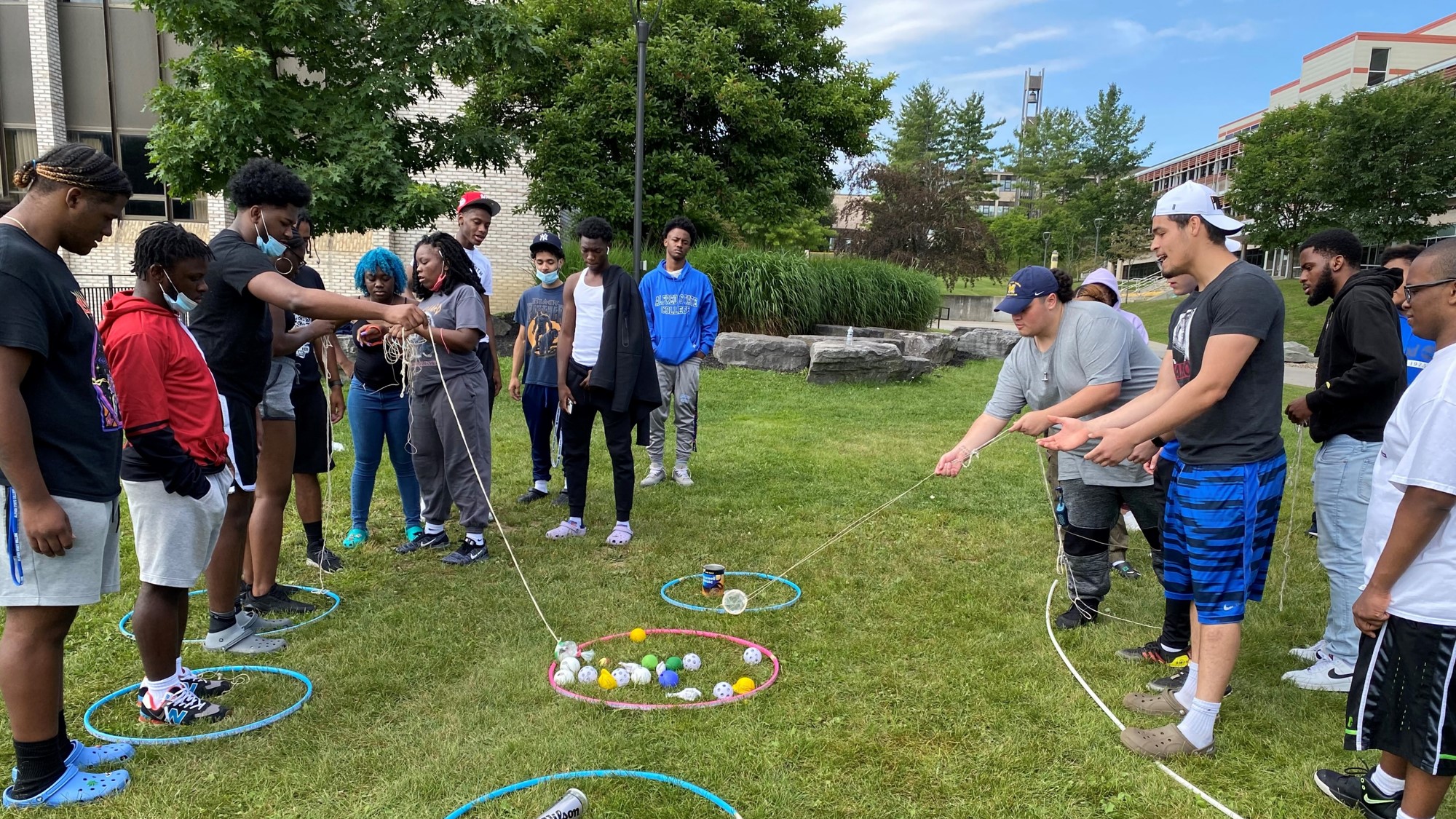 students playing yard games outside