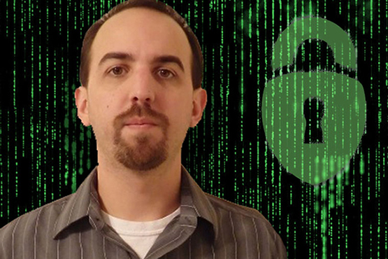 Thomas Richards with green photoshop image of a lock next to him