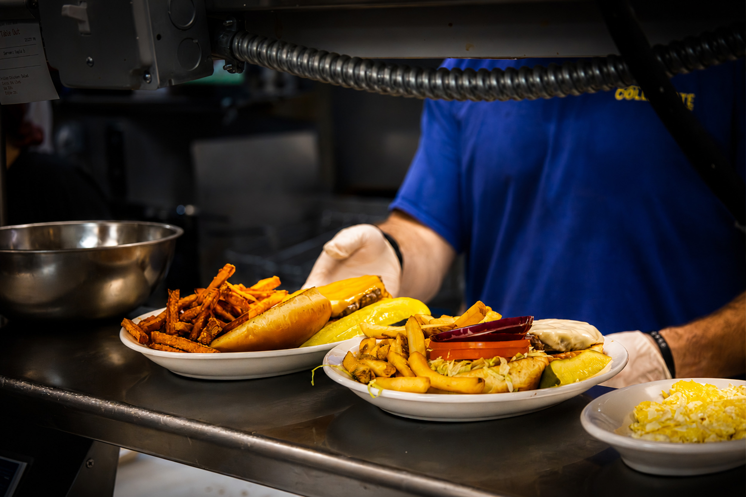 Plates of food being prepared at the Collegiate.
