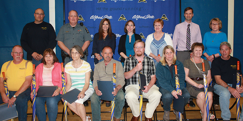 Pictured, sitting, from left to right, are Kenneth Baker, Jacalyn Clemons, Marsha Goodwin, Daniel Davison, Joel Dudley, Laurie Halsey, SueAnn Kring, and Garry Kring. Back row, from left, are Kyle Winans, Jeffrey Wilcox, Amy Werner, Nichole Preston, Marjorie Morgan, Peter McClain, and Tracy Locke.