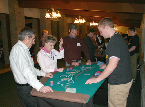 several people at a black jack table
