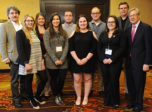 students with professors at the symposium in Washington, DC