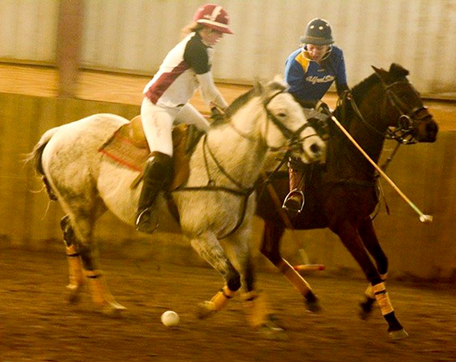 Alfred State Polo member Gwendolyn Shear, heavy equipment operations, Killawog, right, competing against Harvard 