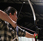 Ethan Frederick takes aim with his bow