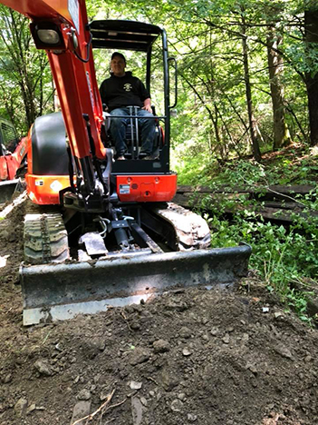 man operating piece of heavy equipment