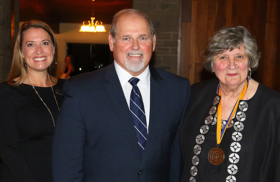 Danielle White, executive director of Institutional Advancement, President Dr. Skip Sullivan, and Dr. Aniko Constantine