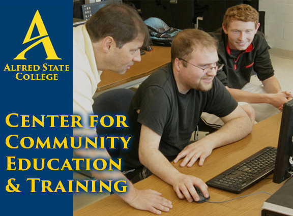 Men at computer Center for Community Education and Training