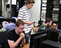 male students in a computer lab