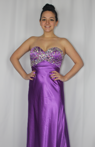 Erin Crotty modeling a purple prom dress