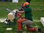 Pioneer Woodsmen’s Club member Gavin Maloney, a masonry major from Rome, NY, takes part in the chainsaw event