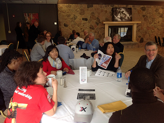 several people sitting around a table