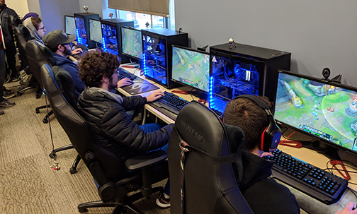 several students sitting in front of computers