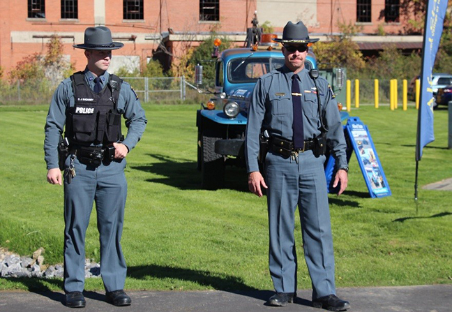 Officer Corwin Mackney and Lt. Scott Bingham standing in uniform