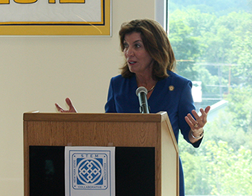 Lt. Gov. Kathy Hochul in front of a podium