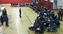 IBEW members speaking to students in the gymnasium
