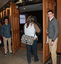 students Casey Connor (business administration, Cotuit, MA) left, and Ian Van Valen (construction management, Ithaca) hold open the doors to the Orvis Activities Center Cappadonia Auditorium