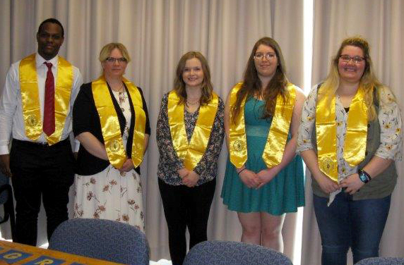 five students wearing yellow ribbons