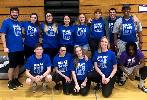 group of students wearing blue t-shirts