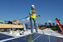 Ryan Kozlowski surrounded by solar panels on top of Team Alfred’s entry in the 2015 US Dept of Energy Solar Decathlon