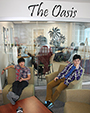 students sitting in chairs in front of The Oasis