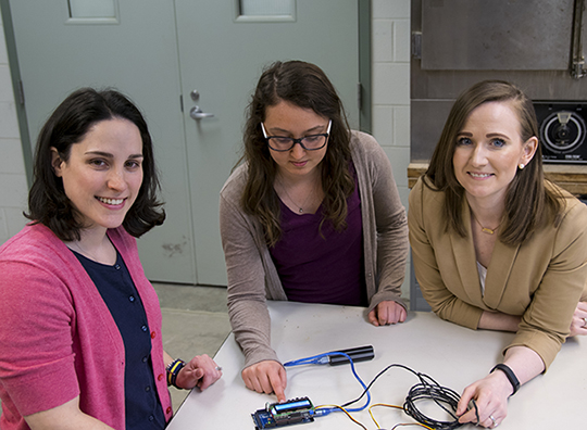 Dr. Danielle Bond, left, female student, and Dr. Tabitha Sprau Coulter