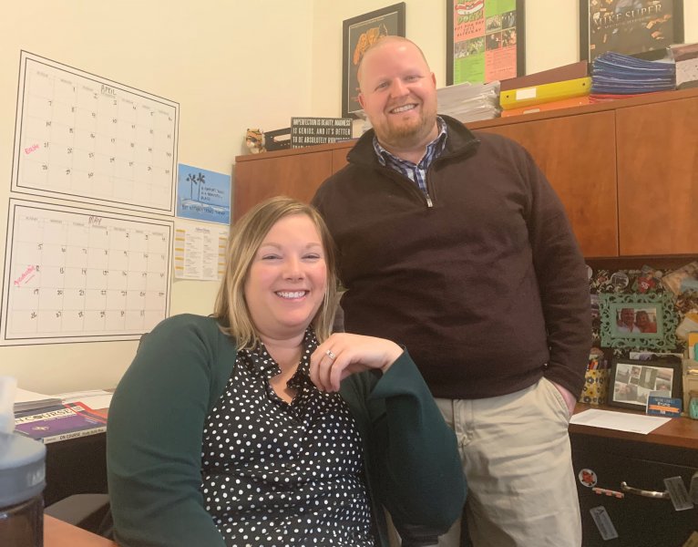 man and woman in an office