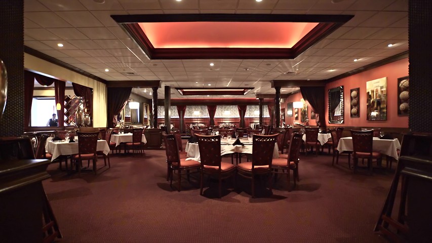 inside Russell's Steakhouse, tables and chairs