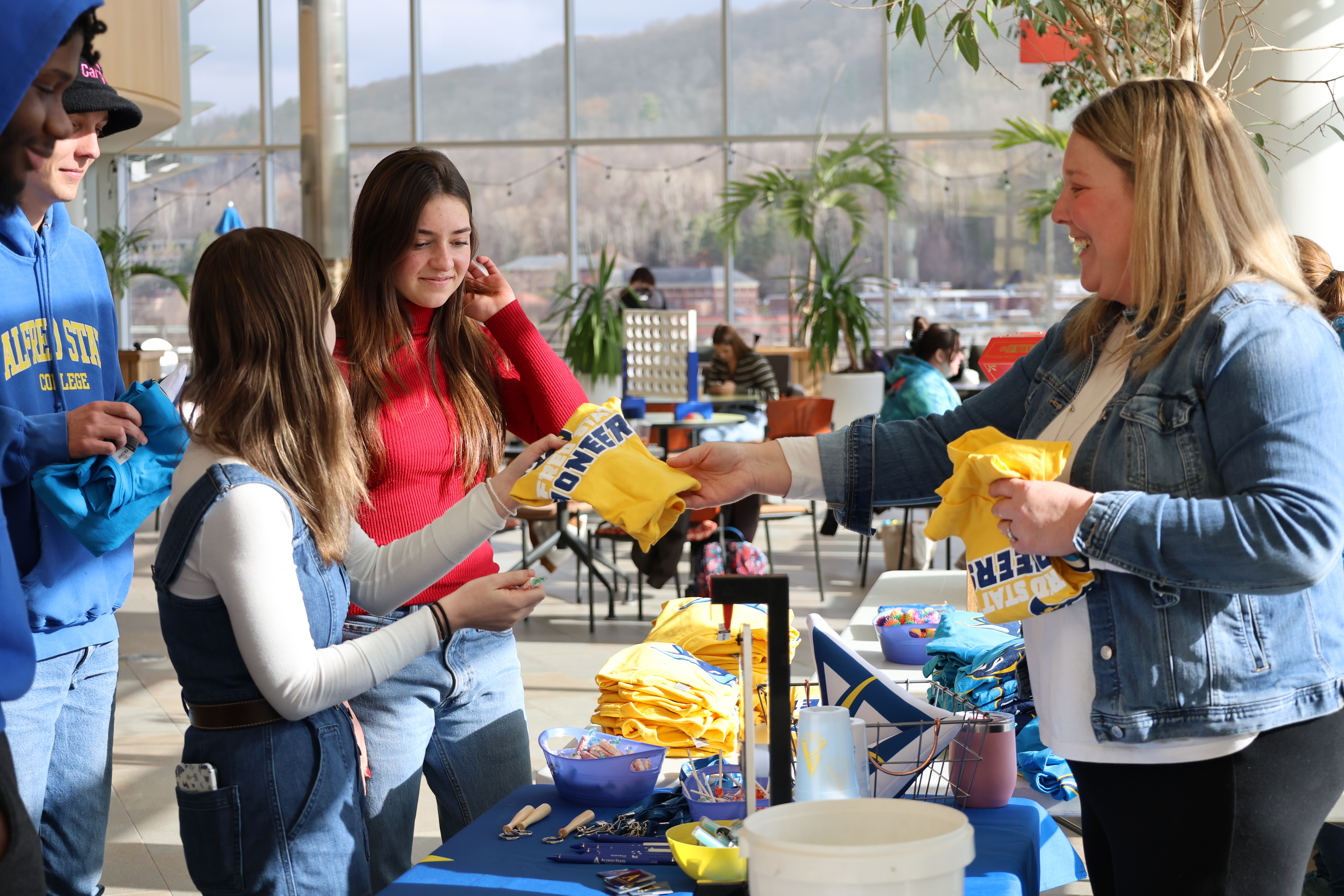students interact with advancement staff during Day of Giving